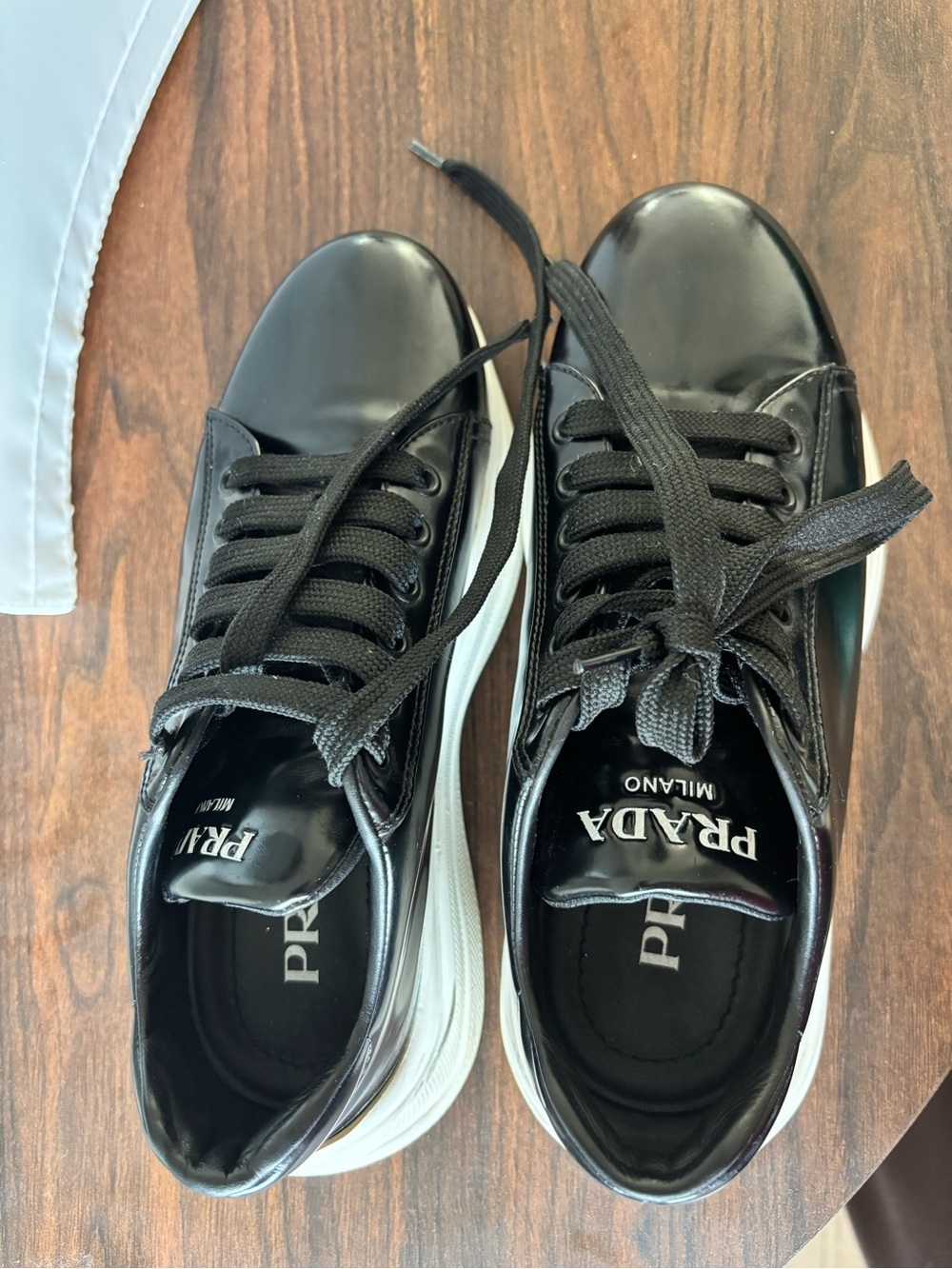 Prada Black and White Leather Low-Top Sneakers